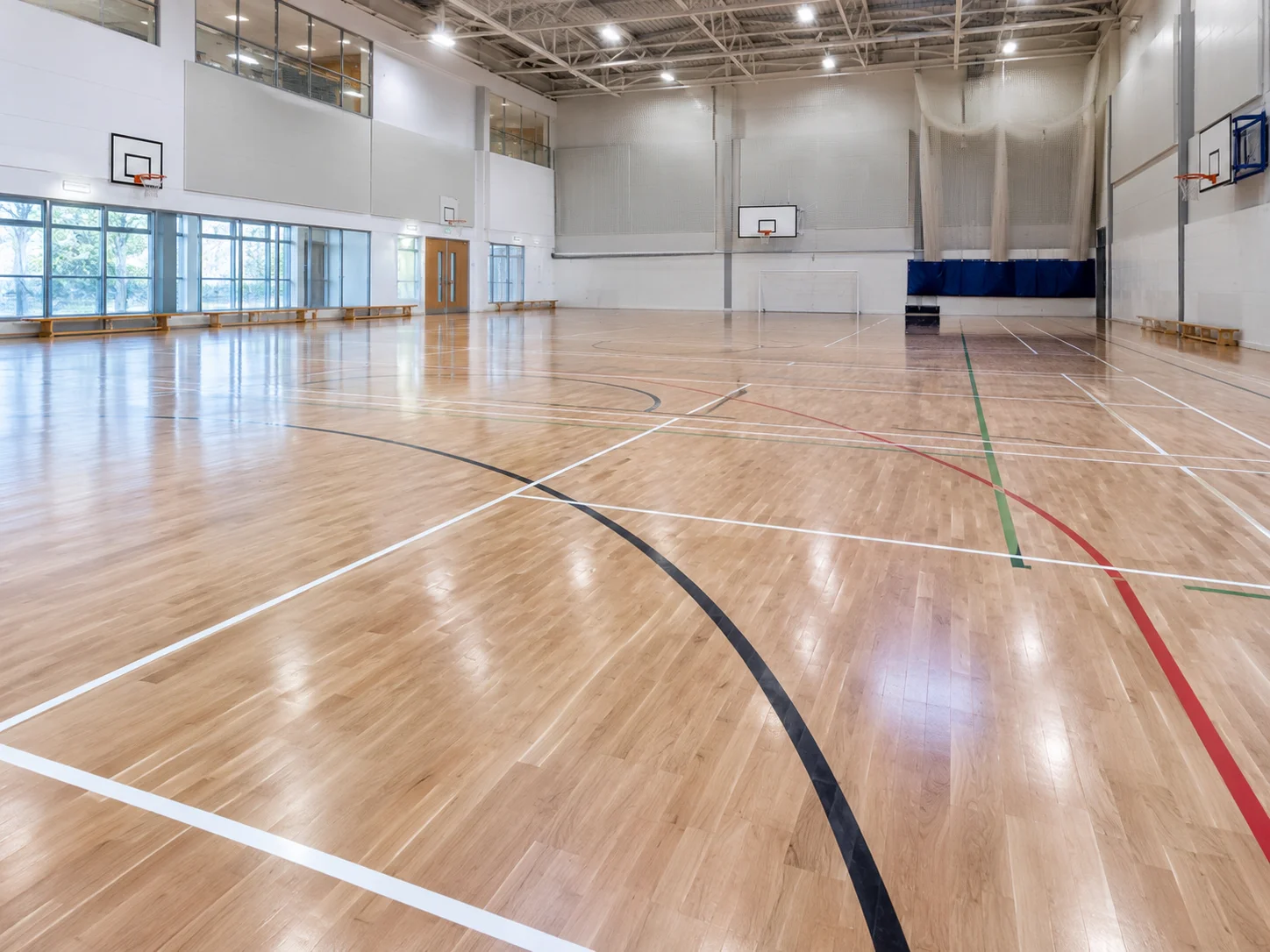 Durable crisp lines on a sports hall floor